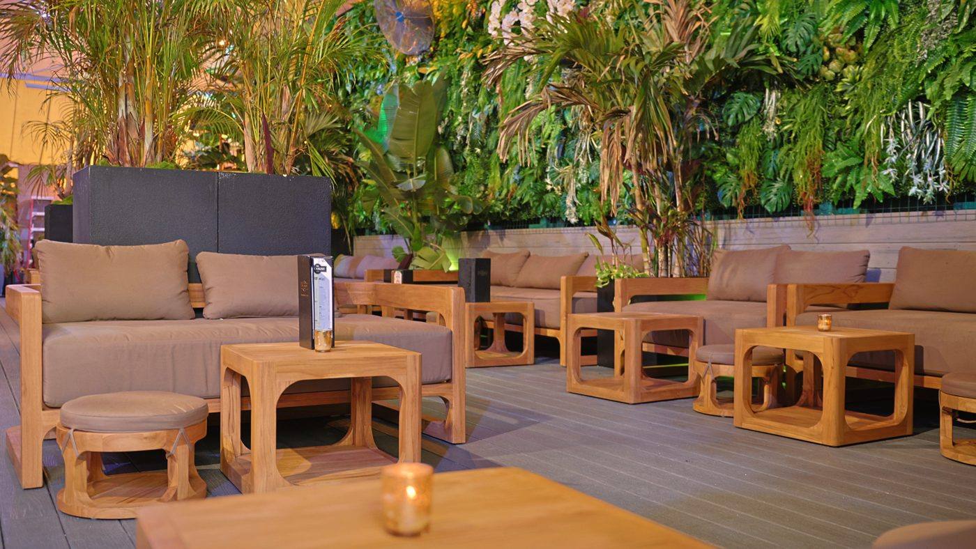 Lounge seating among the plants in the rooftop garden